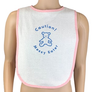 Caution Messy Eater Adult Teddy Bib Adult Sized White Towelling Bib Extra Large In Choice of Bib Edge Colour And Thread Colour Pink