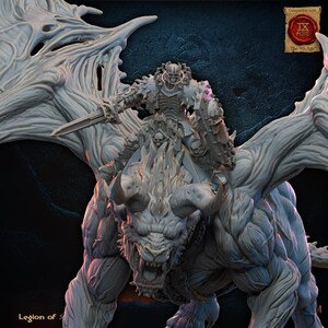 May include: A detailed, grey miniature of a skeletal warrior riding a monstrous beast with large horns and wings. The warrior holds a sword and shield. The image has the text "Compatible with IX AGE The 9th Age" in the upper right corner.