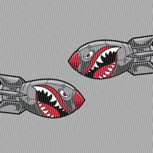 Könnte beinhalten: Zwei Cartoon-Bomben mit einem Haimaul-Design. Die Bomben sind grau mit roten Zähnen und einem roten Auge. Die Bomben fliegen in der Luft.