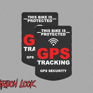 Könnte beinhalten: Zwei schwarz-weiße Aufkleber mit dem Text "Dieses Fahrrad ist geschützt" und einem roten GPS-Logo mit dem Text "GPS-Tracking" und "GPS-Sicherheit". Die Aufkleber befinden sich auf einem grauen Hintergrund.