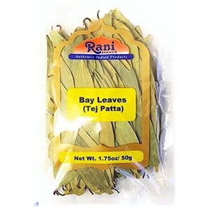 May include: A clear plastic bag filled with dried bay leaves, labeled "Rani Brand Authentic Indian Products Bay Leaves (Tej Patta) Net Wt. 1.75oz/50g".