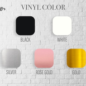 May include: Image displaying vinyl color options: black, white, silver, rose gold, and gold. The text "VINYL COLOR" is at the top, with the brand name "Subero Designs" in the upper left corner. The colors are displayed as square swatches.