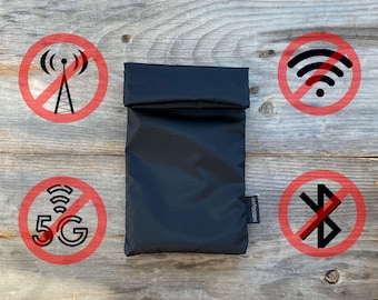May include: A black pouch with a fold-over flap and a white "Signal Blocker" label. The pouch is surrounded by red circles with diagonal lines through various wireless symbols, including a cell tower, wifi, 5G, and bluetooth.