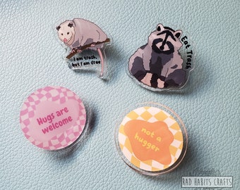 Acrylic Pins | raccoon, possum, hugs, not a hugger