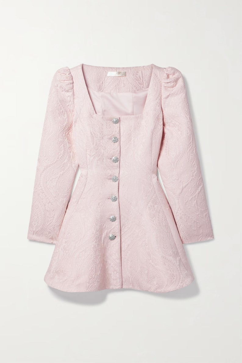 May include: A pink, long-sleeved dress with a square neckline and a button-up front. The dress has a fitted bodice and a flared skirt. The buttons are silver with a sparkly finish.