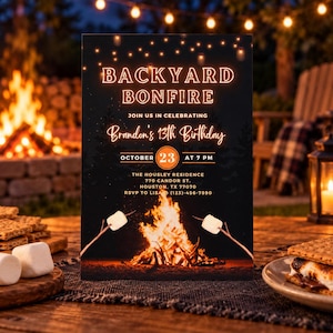 May include: A rectangular invitation card with a black background featuring a neon-style orange text that reads BACKYARD BONFIRE, JOIN US IN CELEBRATING, Brandon's 13th Birthday, OCTOBER 23 AT 7 PM, and event details including an address and phone number.