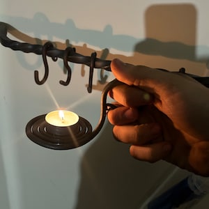 Hand forged candle holder