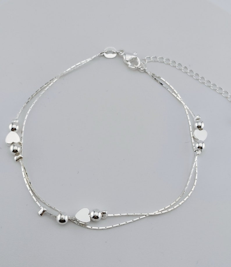 Bracelet de cheville chaîne Boho Beach petit coeur en plaqué argent 925 Three hearts Silver
