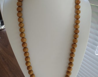 COLLANA IN CORDA CON PERLINE ARANCIONI - Gioielli - Collane - di Bi... | su