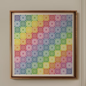 May include: A framed artwork featuring a colorful geometric pattern with a rainbow gradient. The pattern is made up of repeating squares with intricate designs.