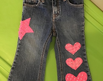 Girls “Stars and Hearts” denim jeans size 24mo.