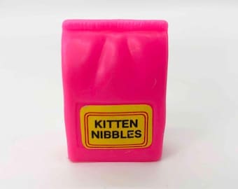 Vintage Barbie 1.75in &quot;Kitten Nibbles&quot; Hot Pink Cat Food Bag Hard Plastic 1980s