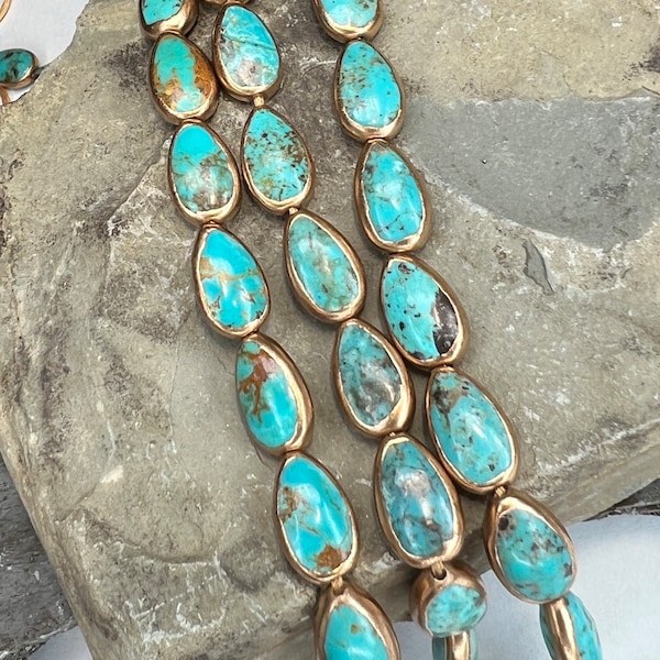 Gold edge tearddrop blue turquoise beads