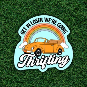 May include: A blue and white sticker with a rainbow, a yellow vintage car, and the text "Get in loser we're going thrifting".