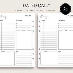 May include: Two white A5 planner pages with black text and lines. The pages are labeled DATED DAILY, PRINTED, PUNCHED, AND SHIPPED. Each page features sections for Saturday or Sunday, Jan 2, 2027 or Jan 3, 2027, a schedule, top 3 priorities, to do, gratitude, and notes.
