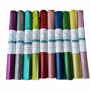 Puede incluir: Diez rollos de vinilo con purpurina de 30,5 cm de largo en varios colores, incluyendo morado, plateado, verde azulado, verde lima, rojo, rosa, azul, verde, dorado y lavanda. Cada rollo est&aacute; etiquetado con "Boutique Goodie Fabrics" e incluye el color y el n&uacute;mero de purpurina.