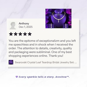 Customer review for Areshna Aurora bridal jewelry set featuring a 5-star rating and testimonial about exceptional quality, luxury packaging, and creative design. The image shows a gold marquise leaf teardrop necklace and earrings on a royal purple display against a marble background.