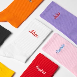 Selection of womens socks in different colours with personalised names embroidered on them