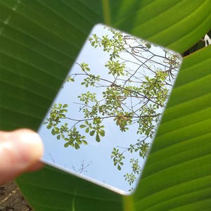 Ultradunne compacte minispiegel: minimalistische reisspiegel