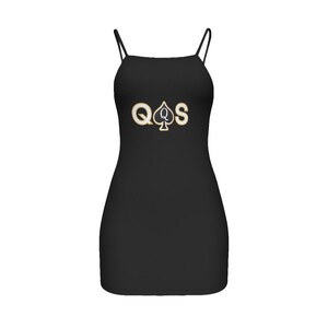 May include: Black sleeveless dress with a gold and black "Q&spades;S" graphic on the front.