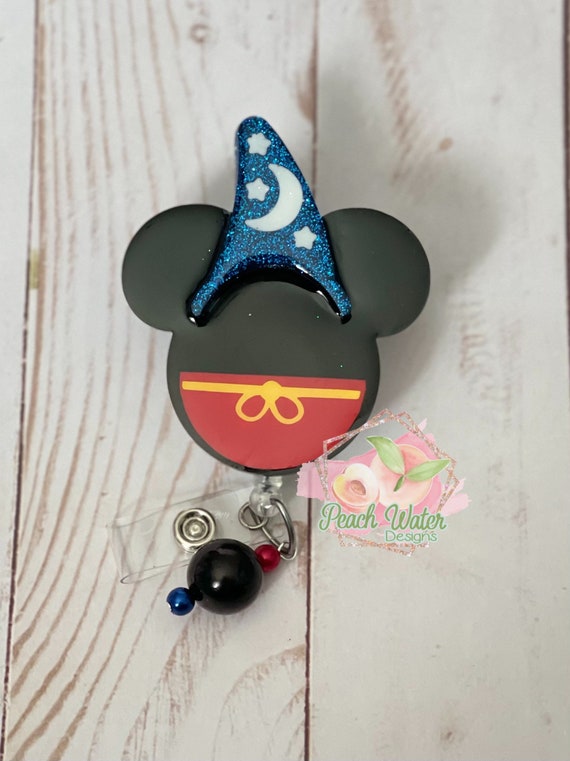 Sorcerer Mickey shaped badge reel