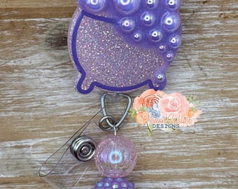 purple cauldron with pearls Halloween badge reel lanyard