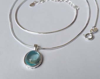 Blue aquamarine adjustable necklace / chain with small pendant. Solid 925 sterling silver mount and chain. Birthstone for March.