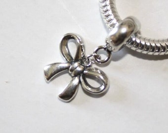 Bow / Ribbon / Butterfly Knot. Dangle bead charm / Pendant. Solid 925 sterling silver. For European style bracelets