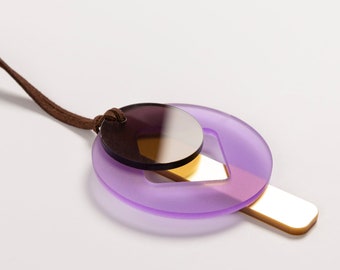 Geometric acrylic necklace. Big pendant in violet, brown and gold colour with leather lace