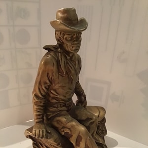 Vintage COWBOY statue made out of ceramic