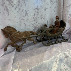 Huntley Manufacturing Co Cast Iron Lady on Sleigh with one horse