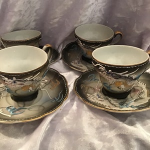 1- Ucagco Moriage Dragonware Tea Cup