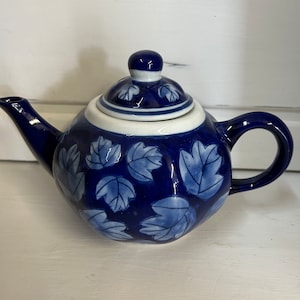 Blue Teapot with beautiful leaves by Design Pac