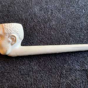 Vintage unused African Male face clay Pipe