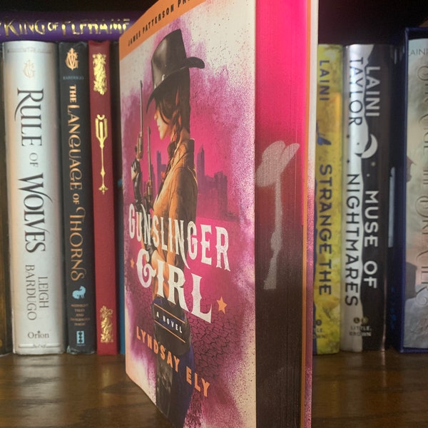 Gunslinger Girl by Lyndsay Eli with sprayed and stenciled pages