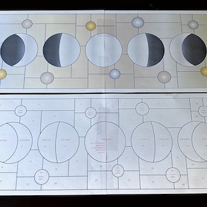 May include: A diagram showing the phases of the moon with instructions to cut out and assemble the pieces. The diagram includes 53 numbered circles with instructions to align the dark and light sides of the moon together.