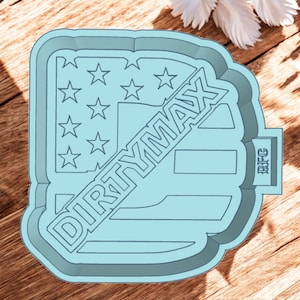 May include: A blue silicone mold with the text "DIRTYMAX" and a stylized American flag design. The mold also has the text "BFFG" on the side.