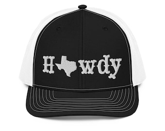 May include: Black and white trucker hat with a white outline of the state of Texas and the word "Howdy" embroidered on the front.