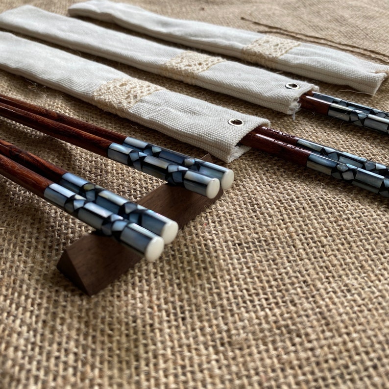 Each set contain: 2 chopsticks (1 pair) + 1 cotton pouch + engraving. This style is  stunning with premium wood quality. We have upgraded the process to higher level to create the most beautiful and the most durable wooden chopsticks ever.