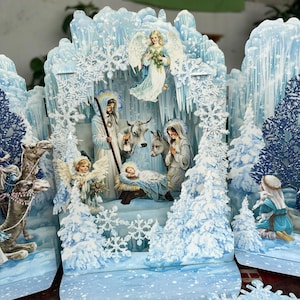 Handgefertigte Winter Wunderland Krippe Pop-Up Frühlingskarte, wunderliche 3D Frühlingskarte mit Krippe und Schneeflocken