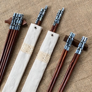 Each set contain: 2 chopsticks (1 pair) + 1 cotton pouch + engraving. This style is  stunning with premium wood quality. We have upgraded the process to higher level to create the most beautiful and the most durable wooden chopsticks ever.