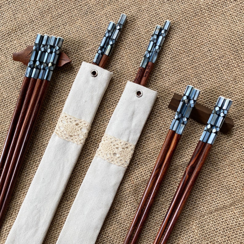 Each set contain: 2 chopsticks (1 pair) + 1 cotton pouch + engraving. This style is  stunning with premium wood quality. We have upgraded the process to higher level to create the most beautiful and the most durable wooden chopsticks ever.