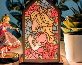 Wood and acrylic tea light holder from Vitrail de Peach. A unique candle holder to decorate a gaming room, creating a cozy and geeky atmosphere!