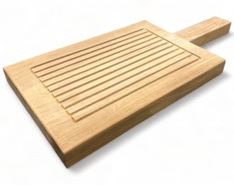 Planche de service en teck, planche à découper avec poignée - planche de cuisine robuste et élégante pour aliments et boissons, 30 x 20 cm avec évidement de 10 mm