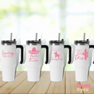 May include: Four white travel mugs with black handles and pink text. The mugs have different designs and text, including "Tequila Made Me Do It", "Nacho Average Bride", "Let's Get Smashed", and "Can't Touch This".