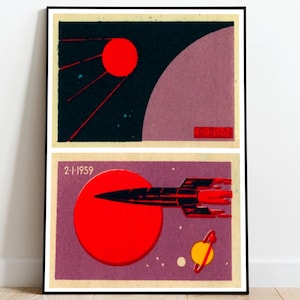 May include: Framed vintage-style space art print. The artwork features a red sun, a black sky with stars, and a red and black rocket ship. The date "2-1-1959" is printed on the artwork.