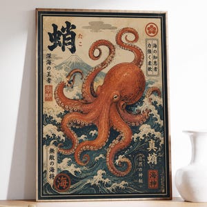 May include: A rectangular wall art print featuring a large orange octopus centered over dark blue crashing waves and a white mountain peak in the background. The artwork includes black Japanese calligraphy, red circular stamps, and decorative borders.