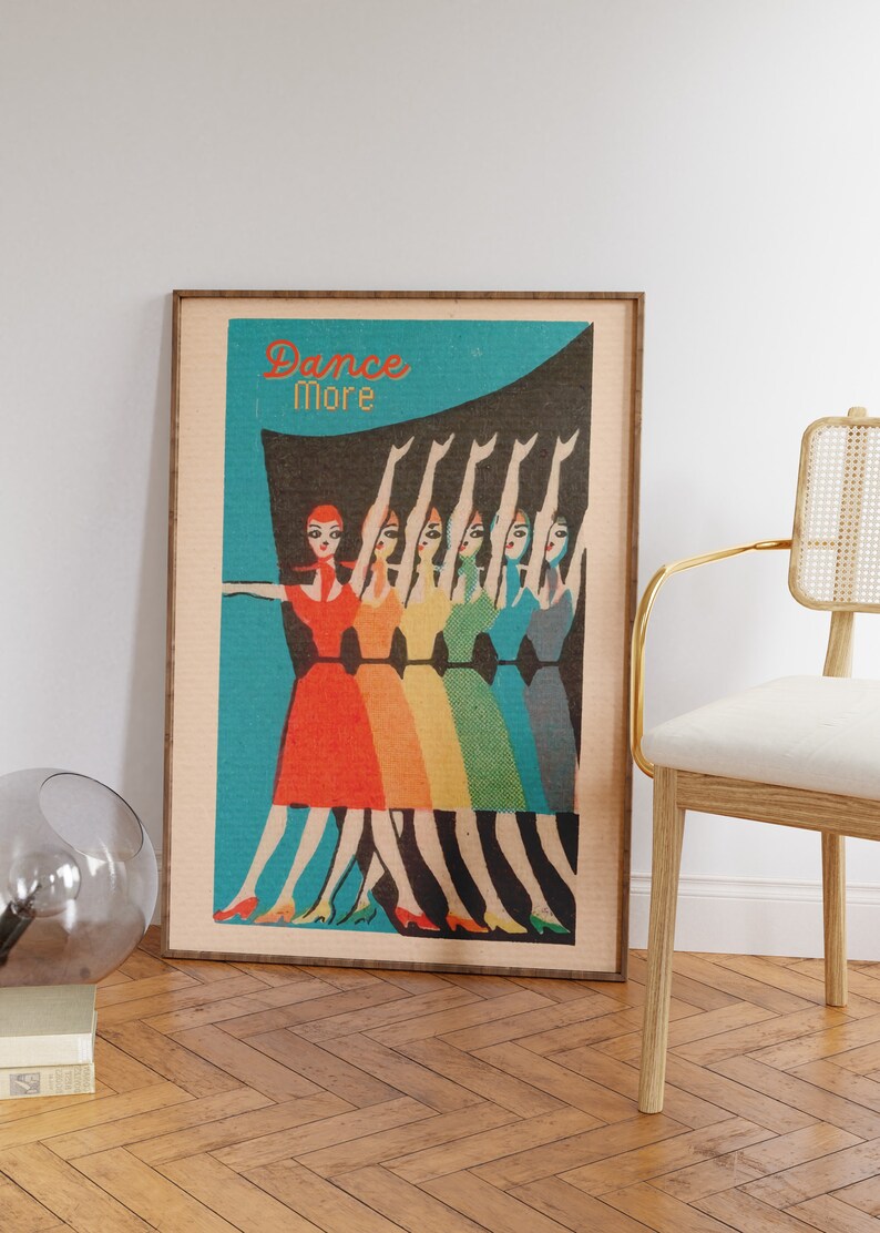May include: A vintage poster with a blue background and the text "Dance More". Seven women in colorful dresses are walking in a line, with their arms raised in the air.