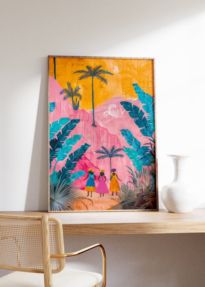 May include: A framed illustration of three women in colorful dresses walking through a pink and yellow landscape with palm trees and tropical foliage.