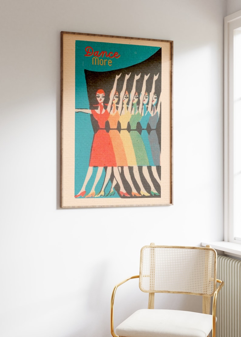 May include: A vintage-style poster with the text "Dance More" in red and white. The poster features a group of women in colorful dresses dancing against a teal background.